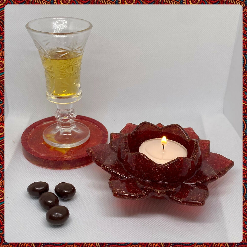 Red and gold sparkling lotus tea lights