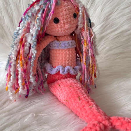 Crochet Mermaid with sparkly tail and colourful hair.