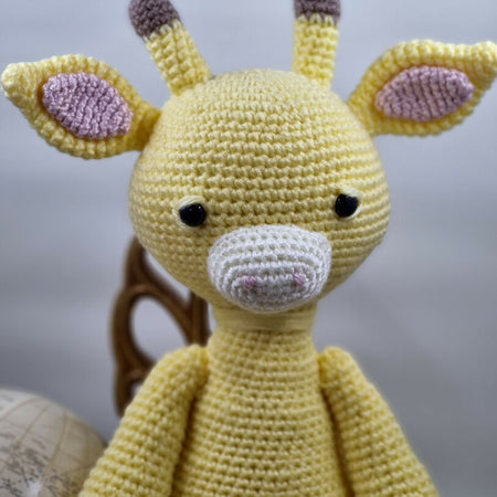 Handmade crochet giraffe plush toy