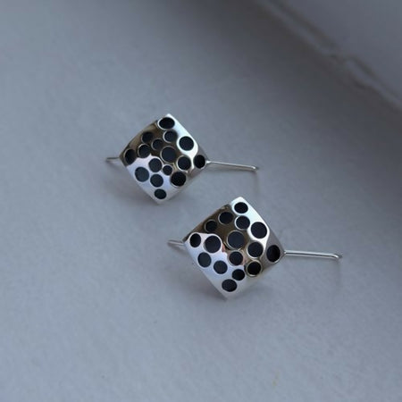 square domed holey earrings