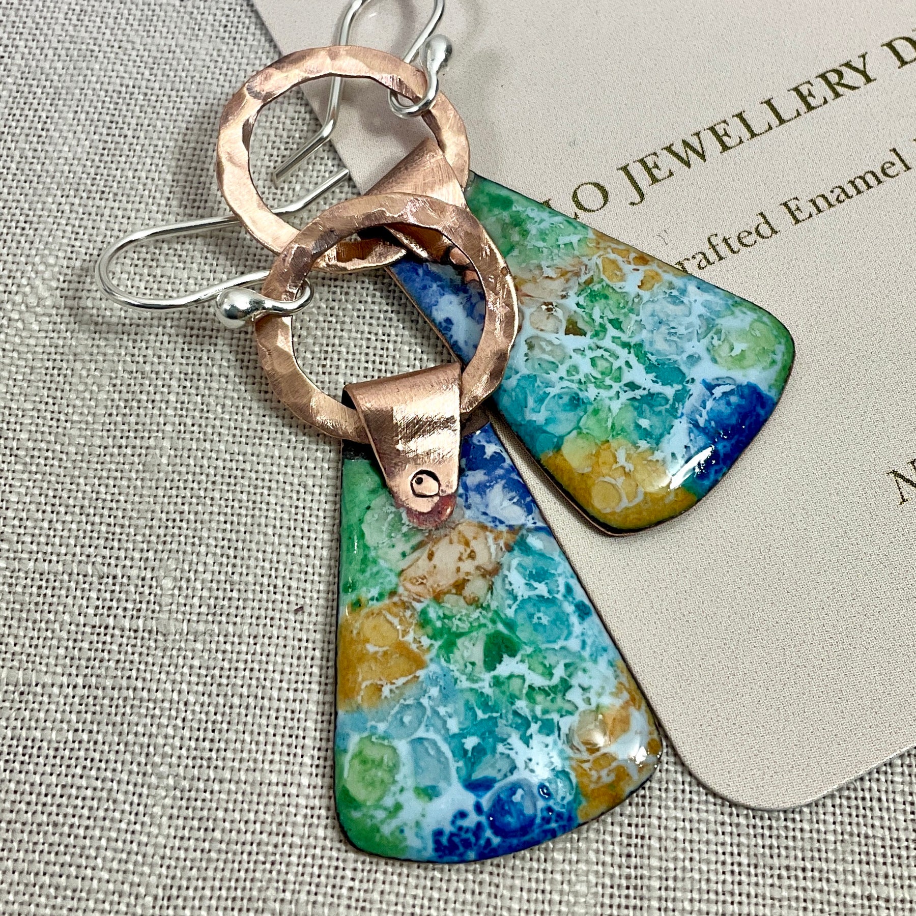 Enamel and copper earrings.