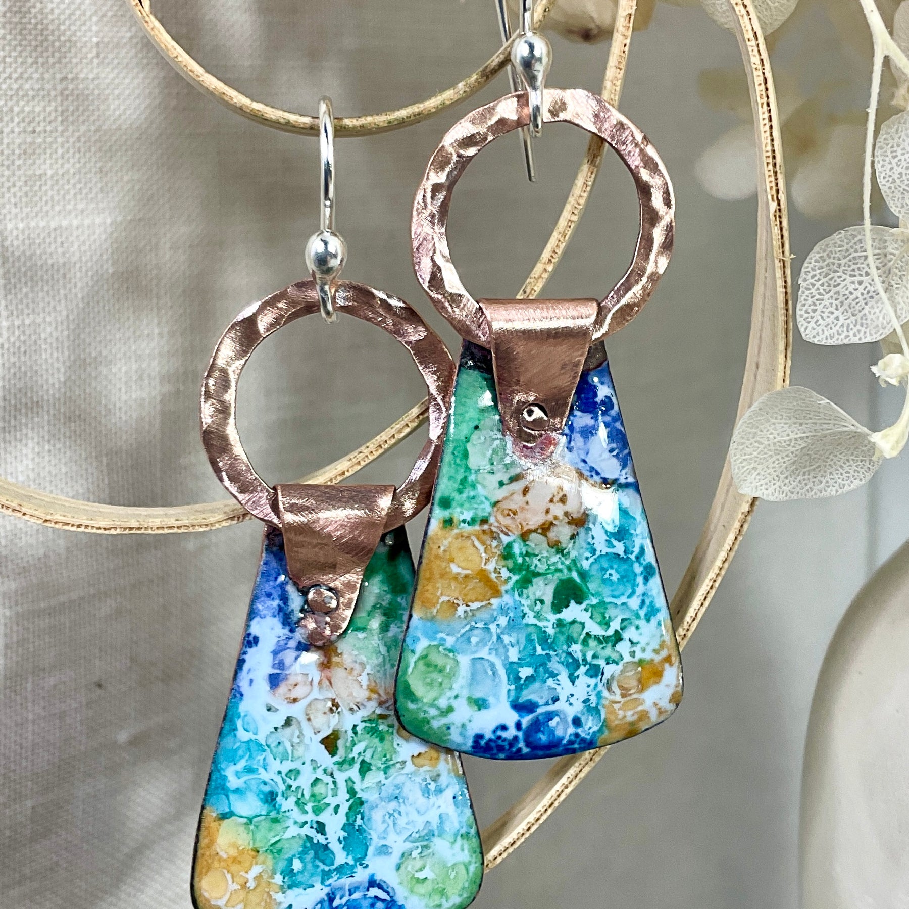 Enamel and copper earrings.