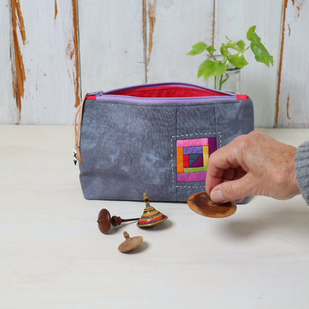 Hand dyed zipper pouch, with patchwork panels.