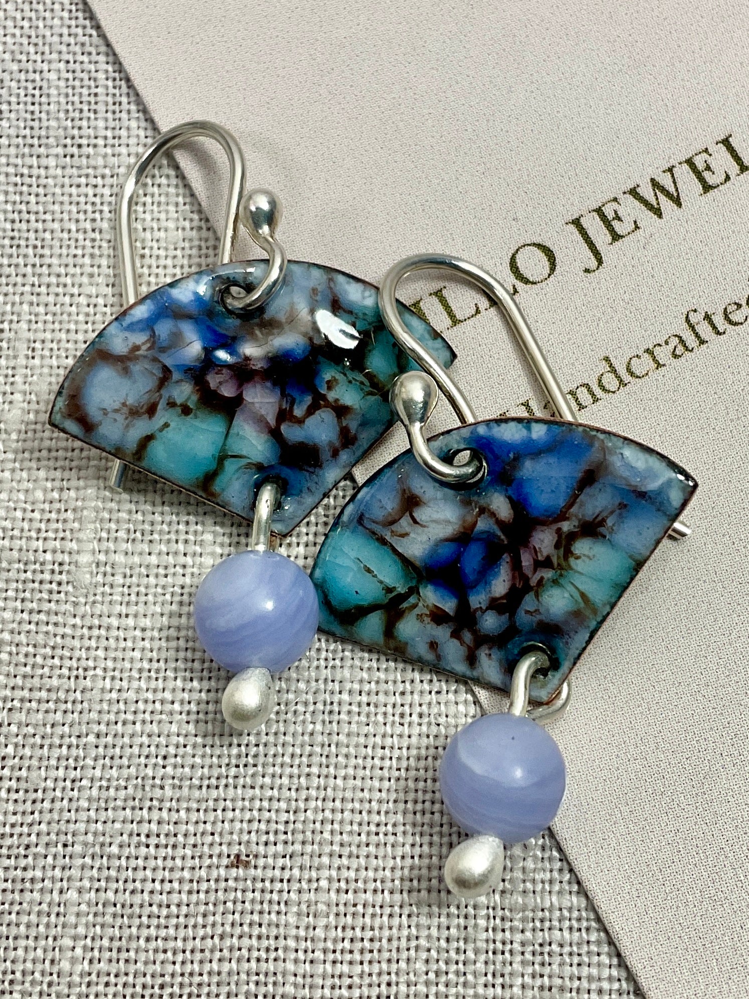 Blue enamel earrings with gemstone