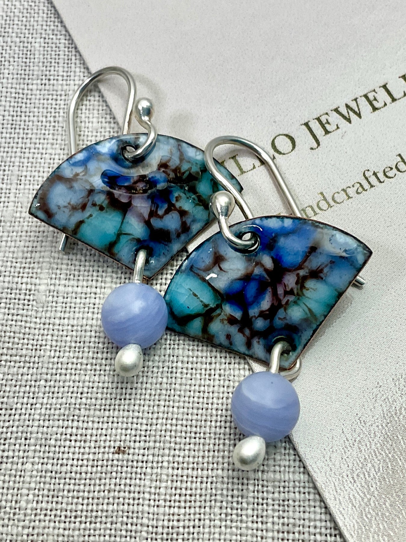 Blue enamel earrings with gemstone