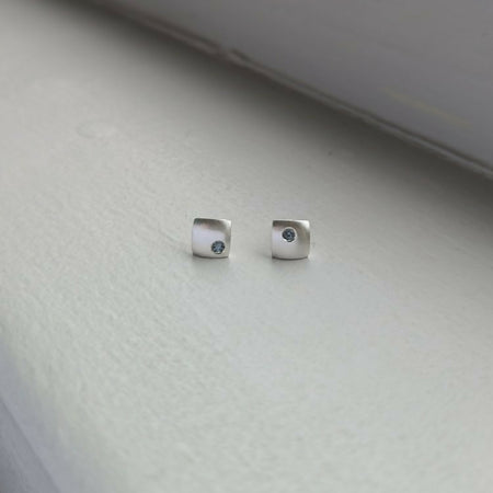 handmade grey spinel × domed square studs