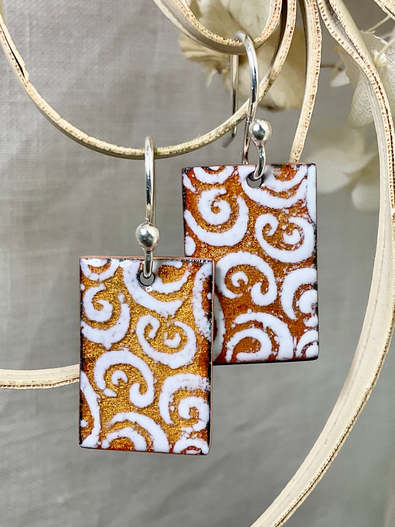 Golden and white pattern earrings. Enamel. Handmade