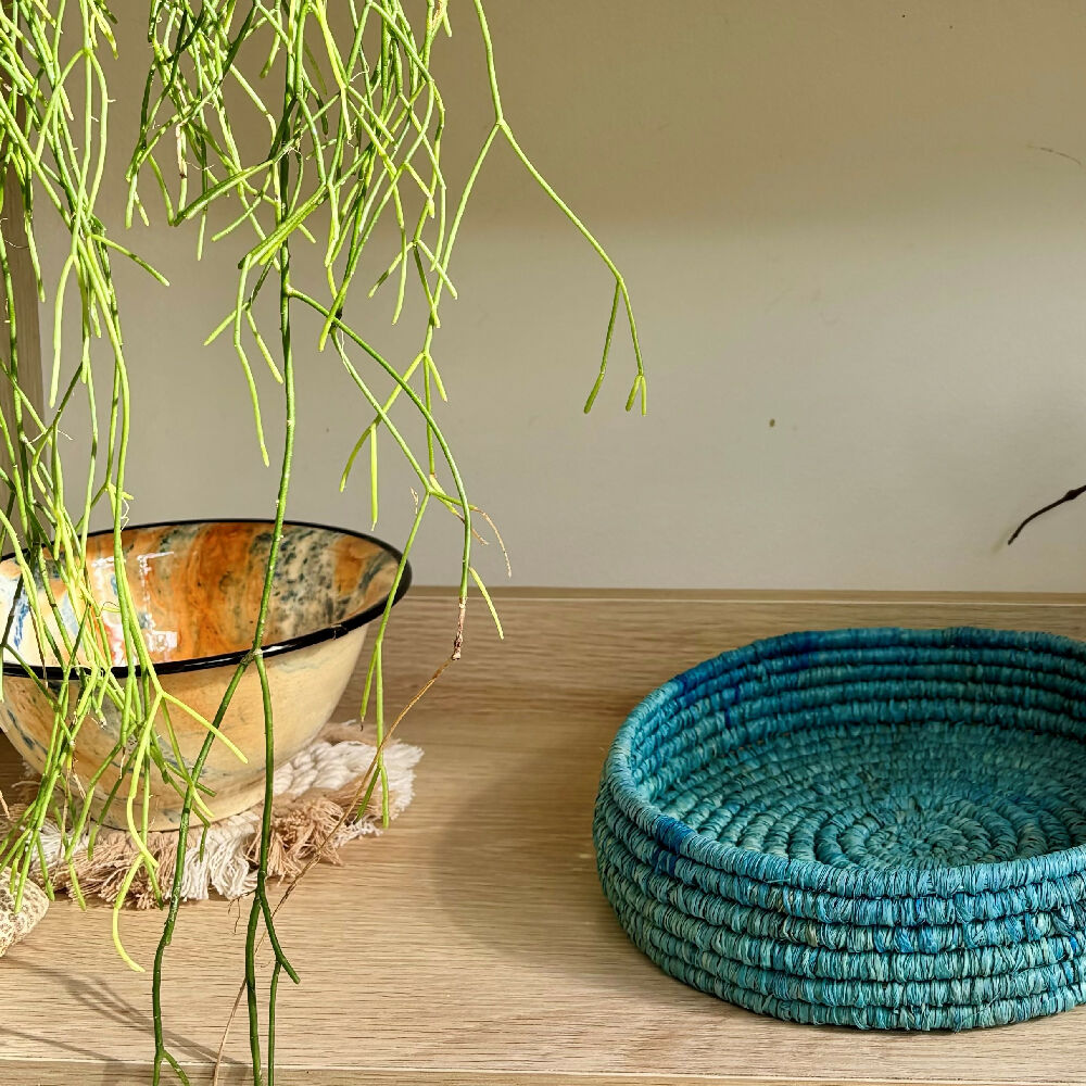 Handcrafted bright blue raffia bowl