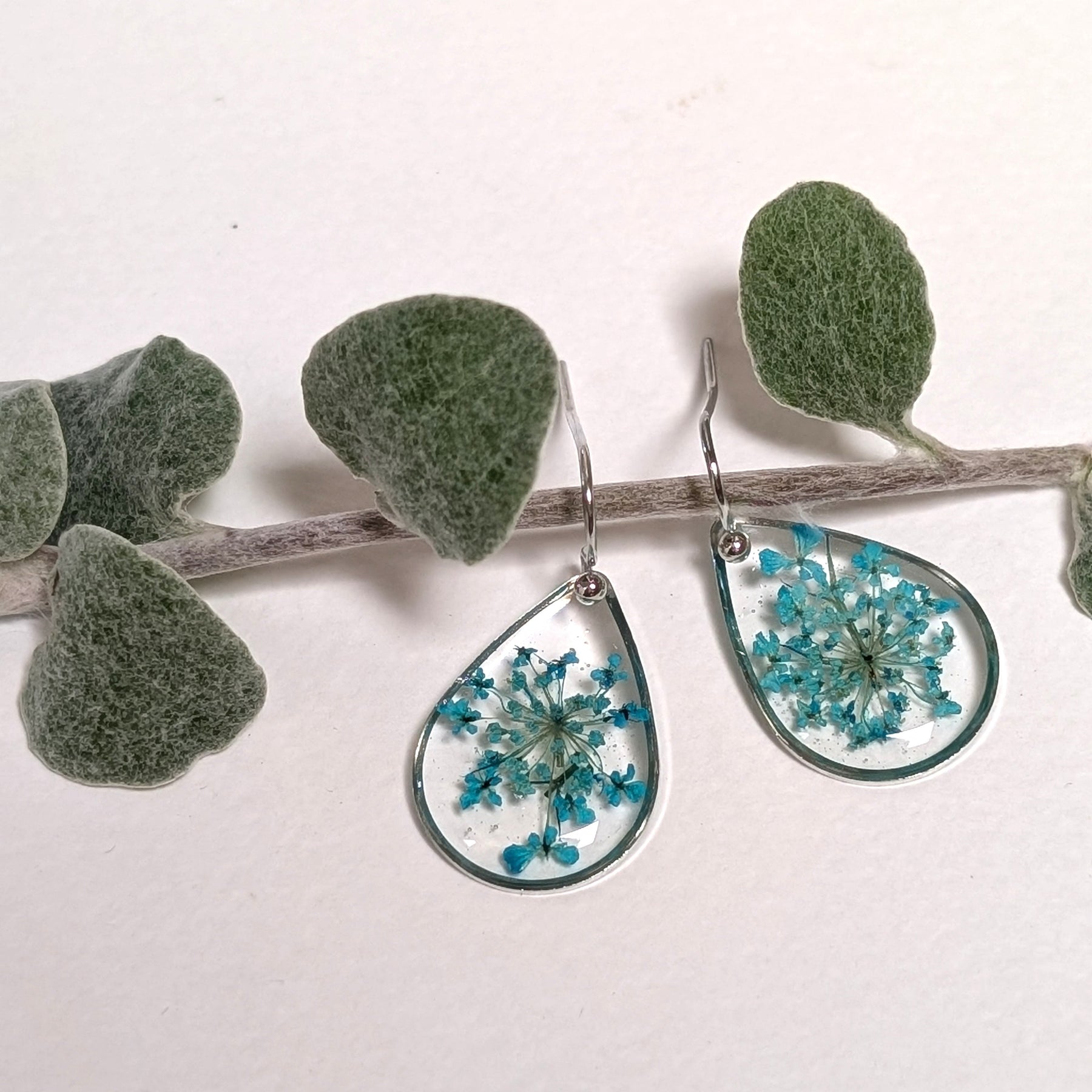 Teardrop silver earrings with teal Queen Anne's Lace