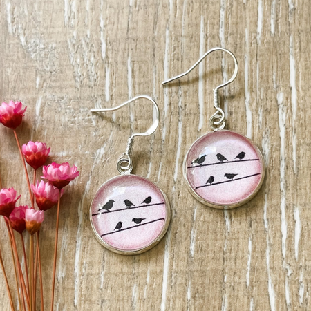 Little Bird Earrings on Pink.  Handmade with Papers and Glass