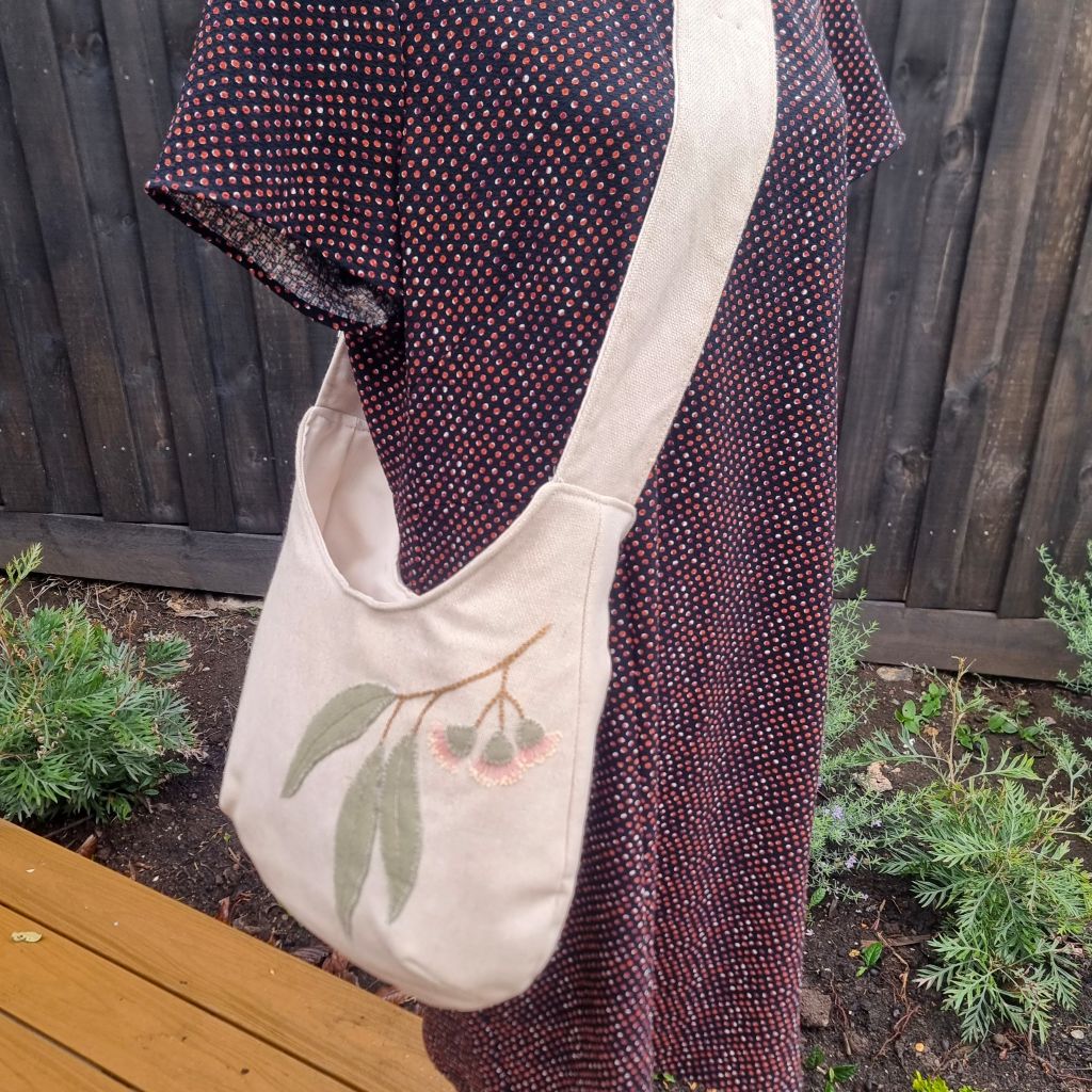 Sadie Jane upcycled hobo bag - appliqued eucalyptus blossom