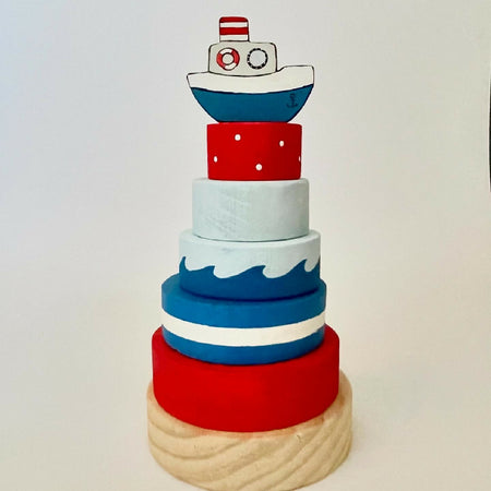 Ring stacker with boat topper.