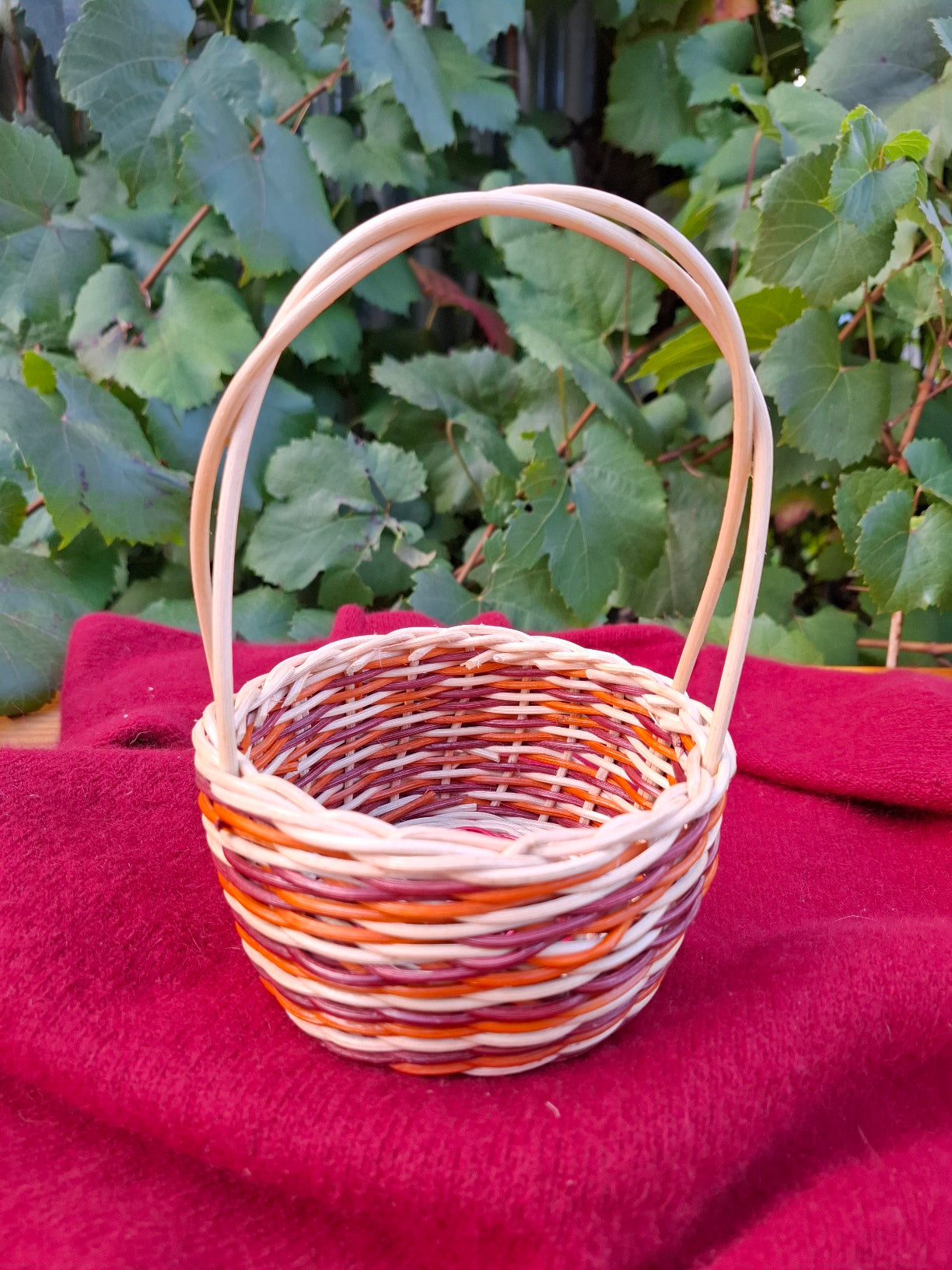small orange brown handled basket