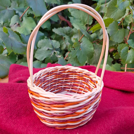 small orange brown handled basket