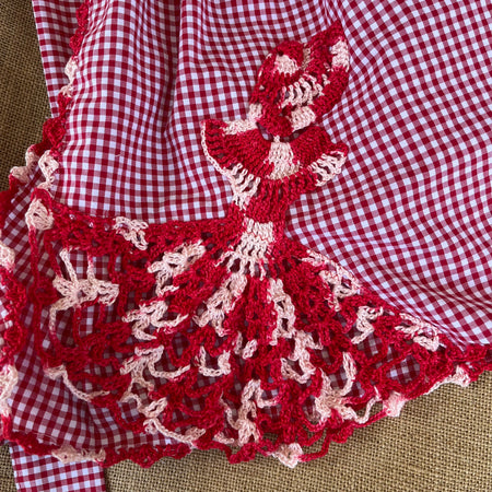 Red gingham apron with hand crochet lady