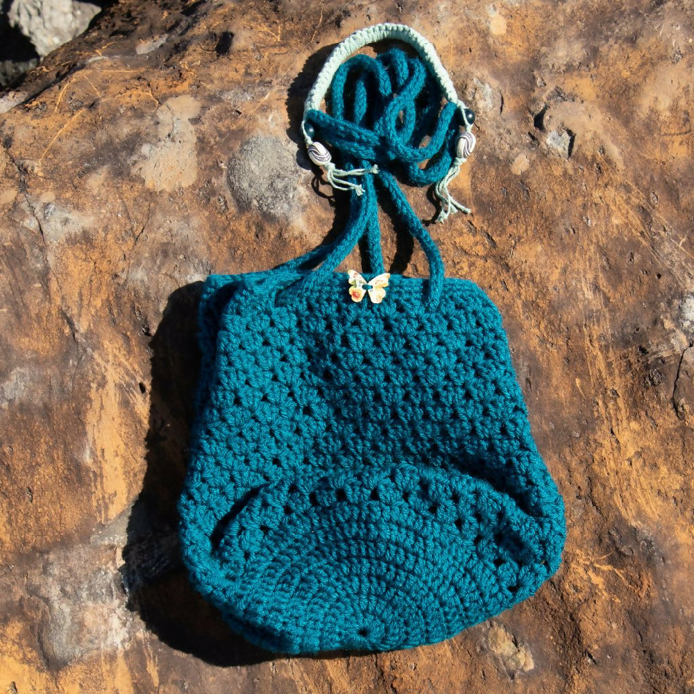 Green crocheted cross body bag