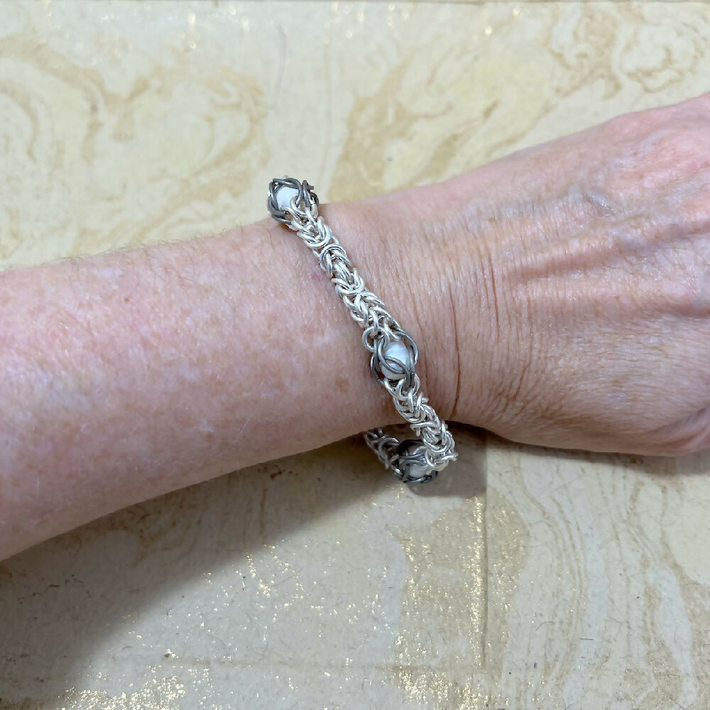 Silver filled byzantine captured pearls bracelet hand