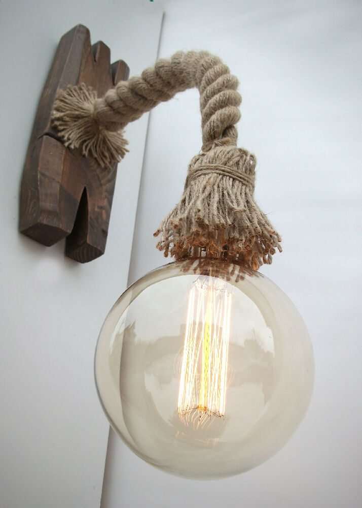 Wall light made from a rope and natural wood