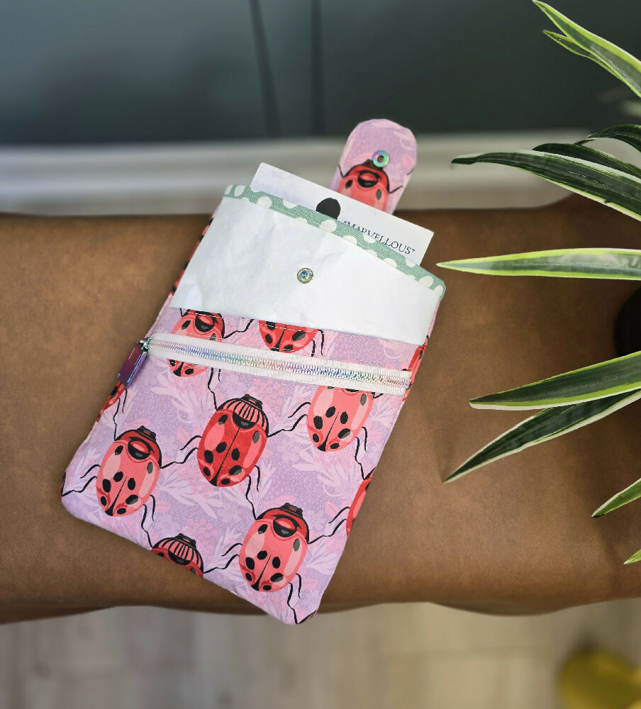 Book sleeve. Pink. Lady birds. Lady beetles.