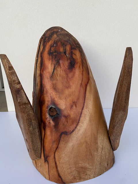 Hand carved breeching whale sculpture
