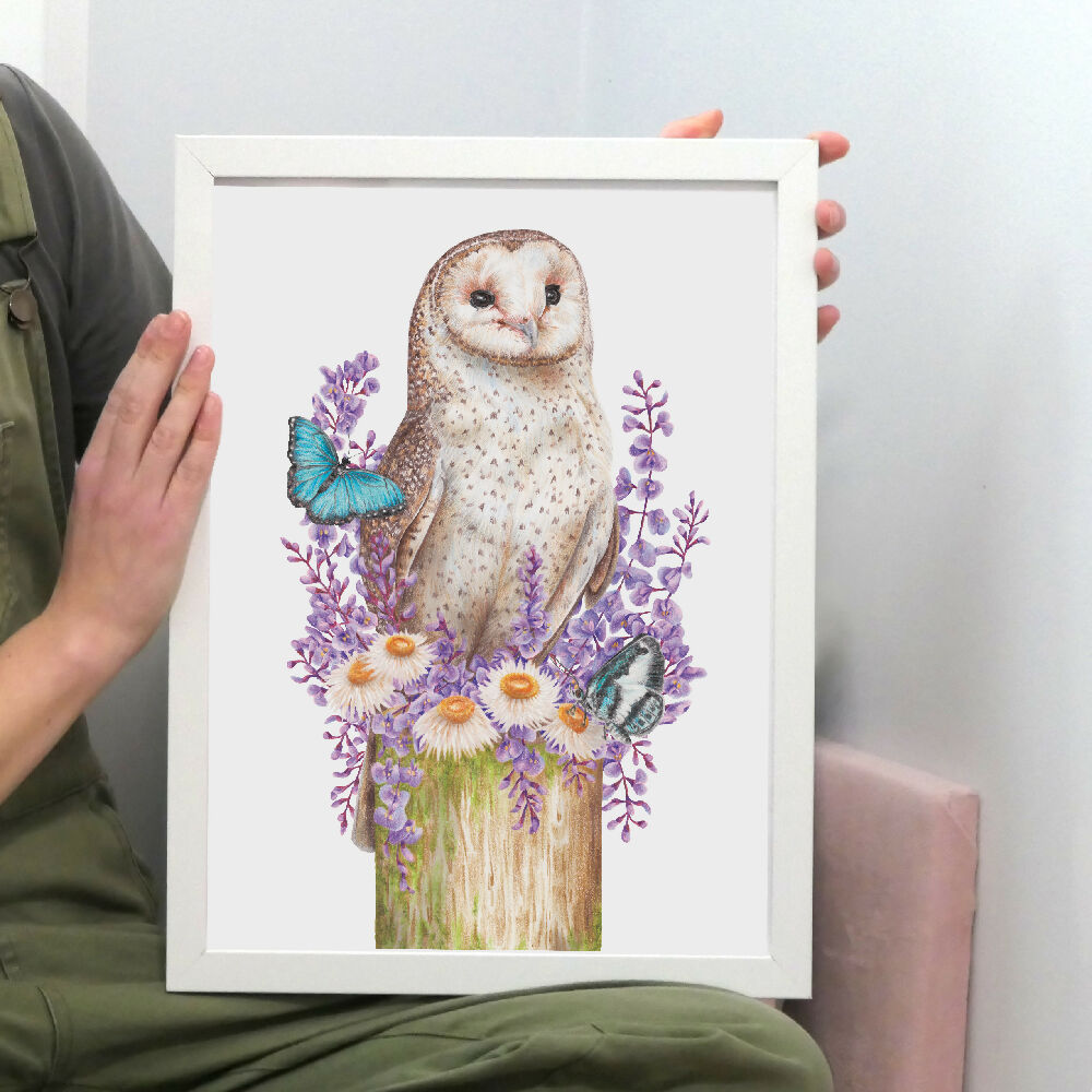 A4 art print of an Australian Masked Owl surrounded by butterflies and native Australian flowers, illustrated by Australian artist Kayla Reay.