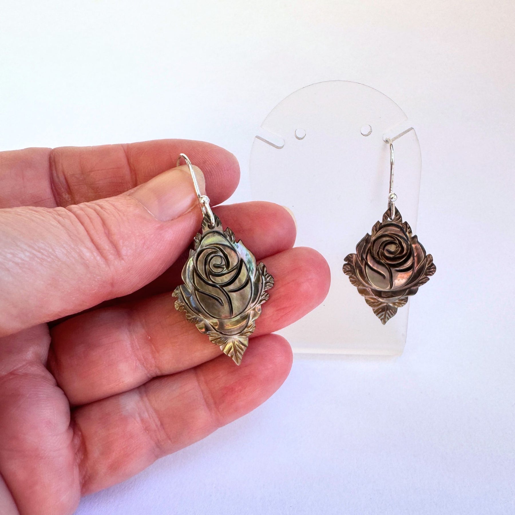 Carved black mother or pearl sterling silver earrings