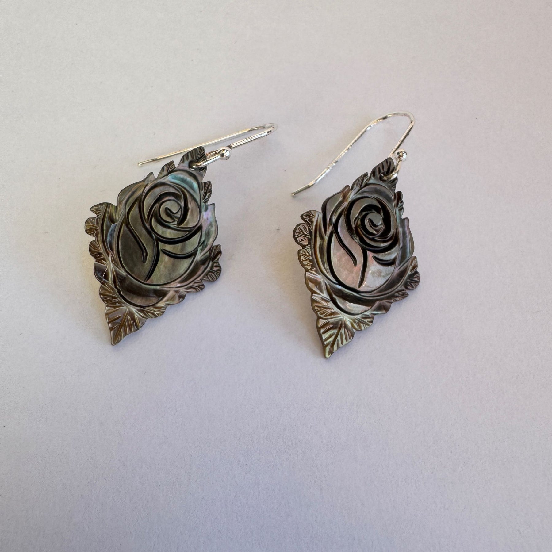 Carved black mother or pearl sterling silver earrings