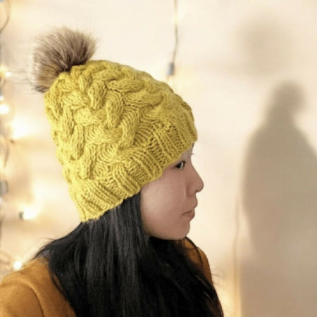 Cable hand Knit Chunky Beanie in Mustard yellow with brown fur pompom