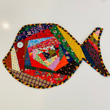 Fish shaped table mat