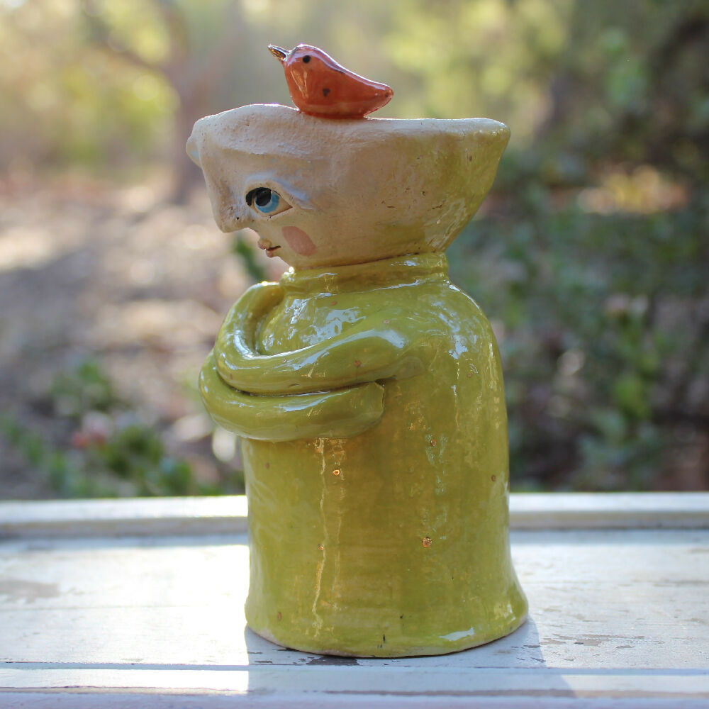 clay yellow green candlestick with bird pottery