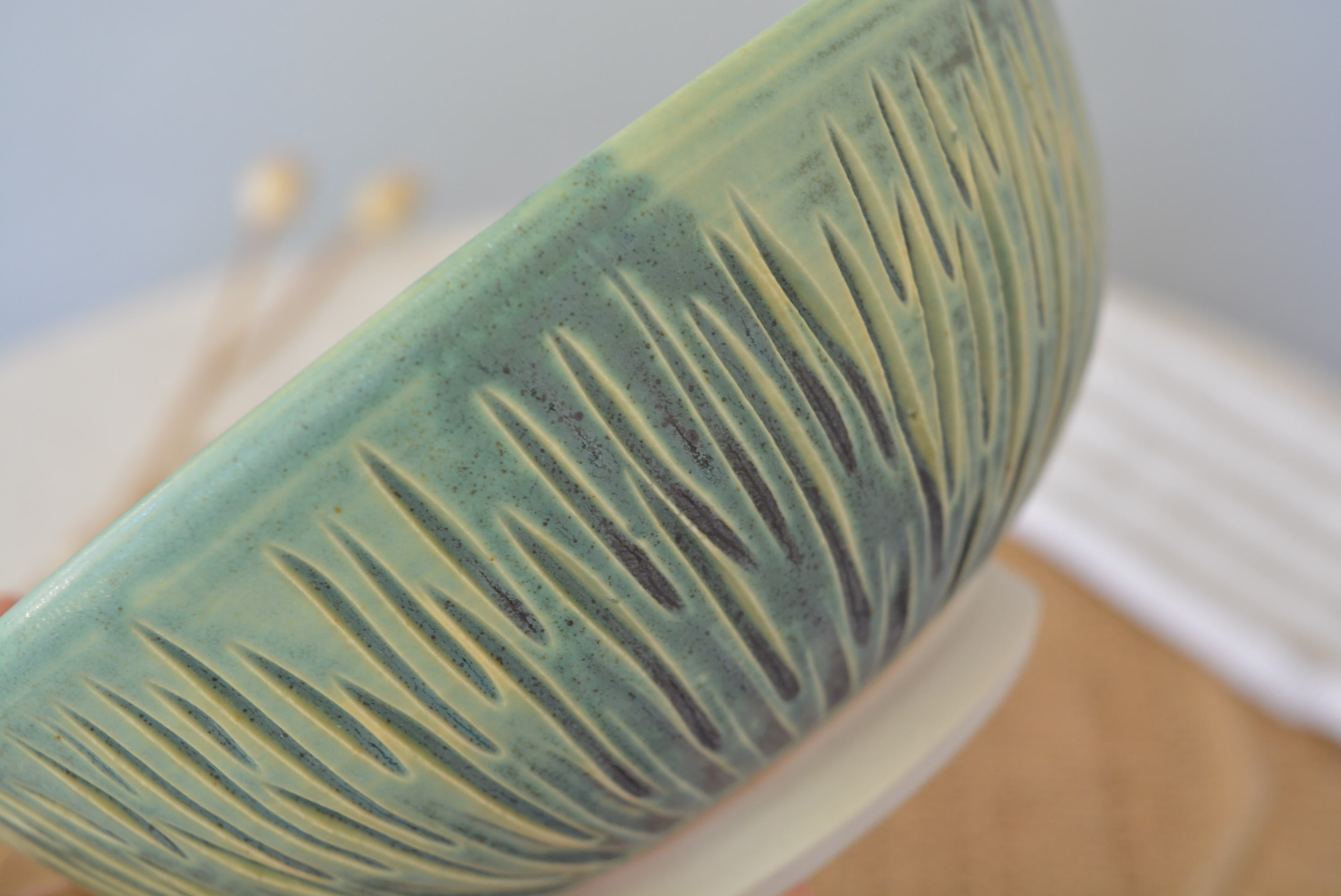 Handmade carved wheel thrown pottery bowl