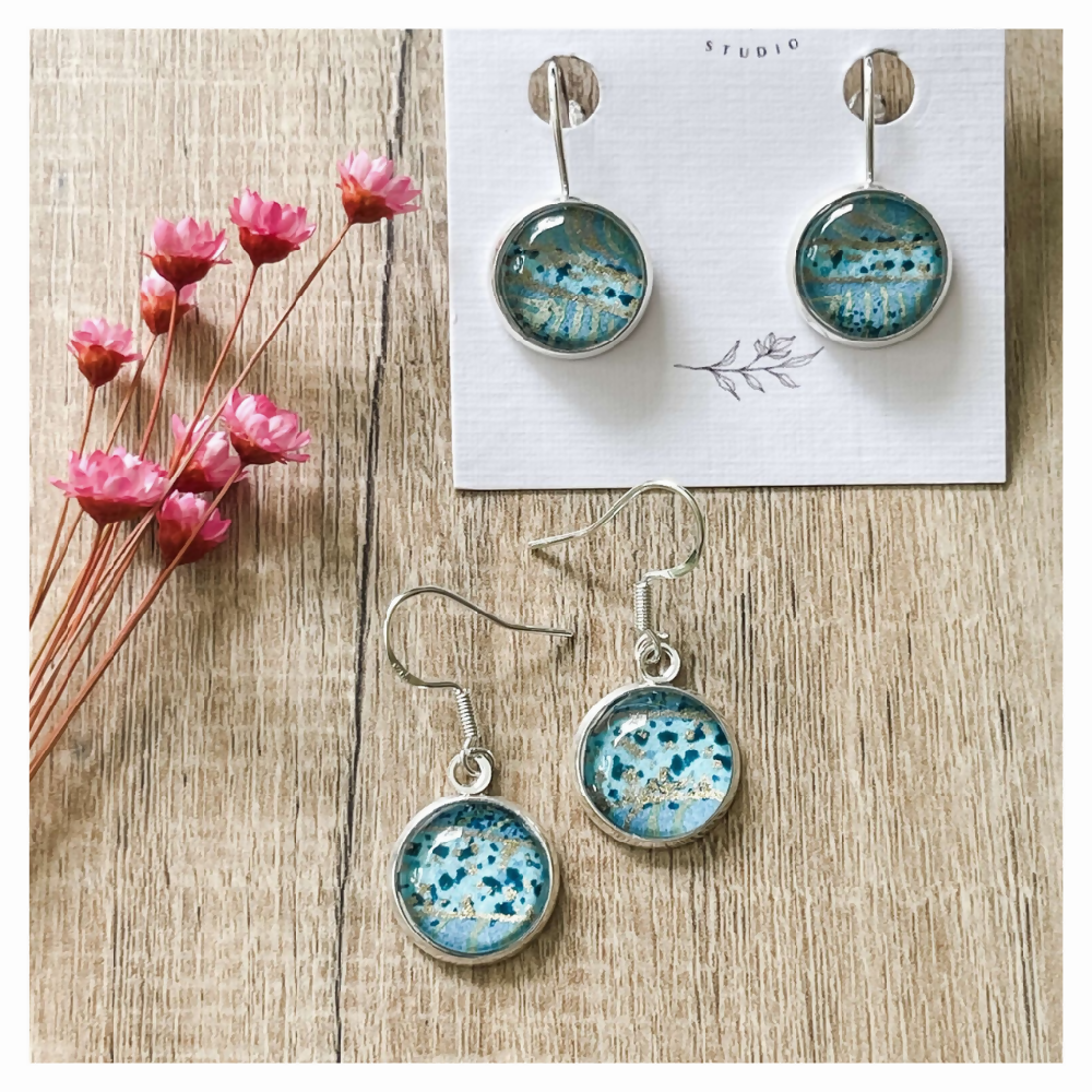 Blue and gold patterned earrings in dangles or studs