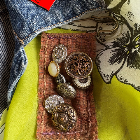 Buttoned and hand stitched brooch!