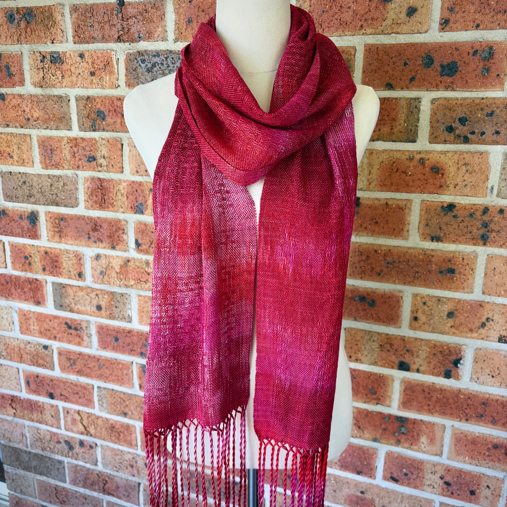 Dark-pink-tencel-scarf-draped-mannequin-handwoven-entangled-happiness-handwovens