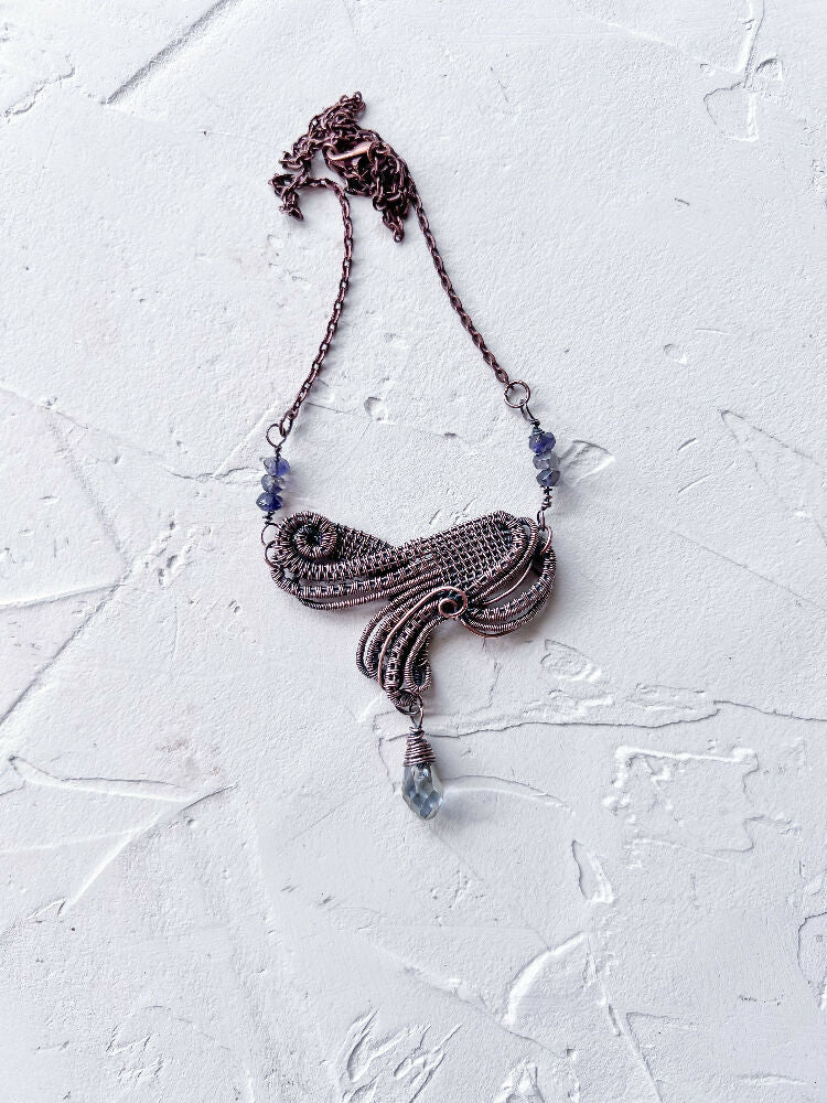 Sophisticated Wire Woven Pendant with Iolite Accents