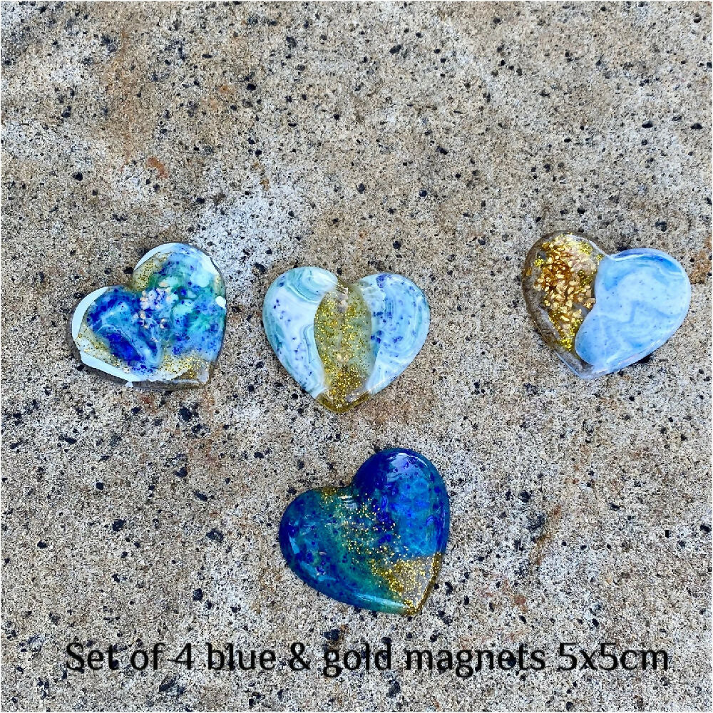 Set of four blue and gold magnets