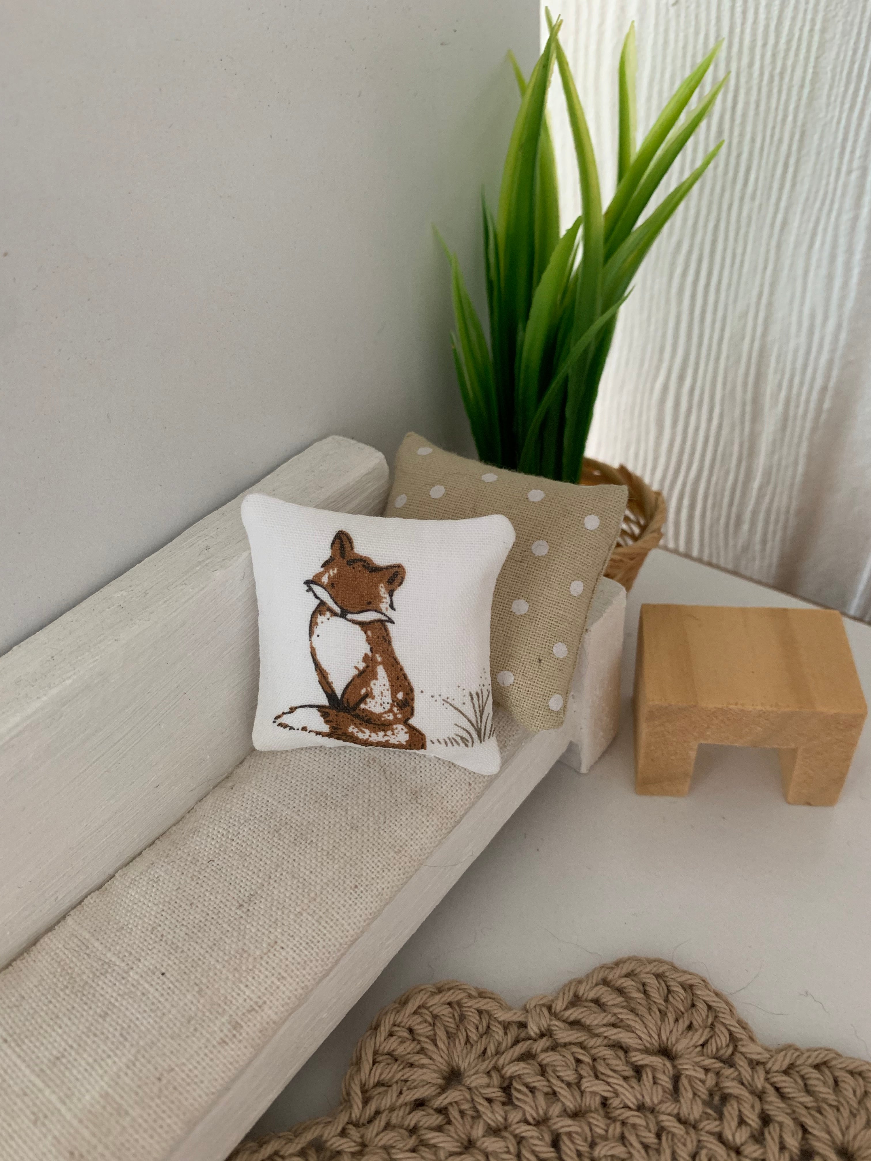 Miniature woodland throw pillows, dollhouse cushions.