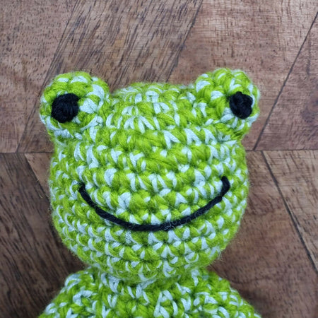Handmade crochet frog plush toy