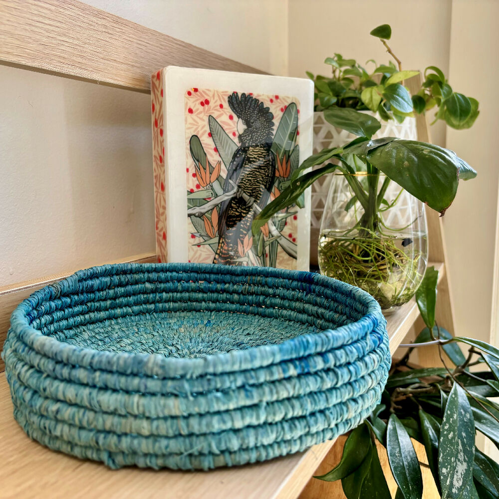 Handcrafted bright blue raffia bowl