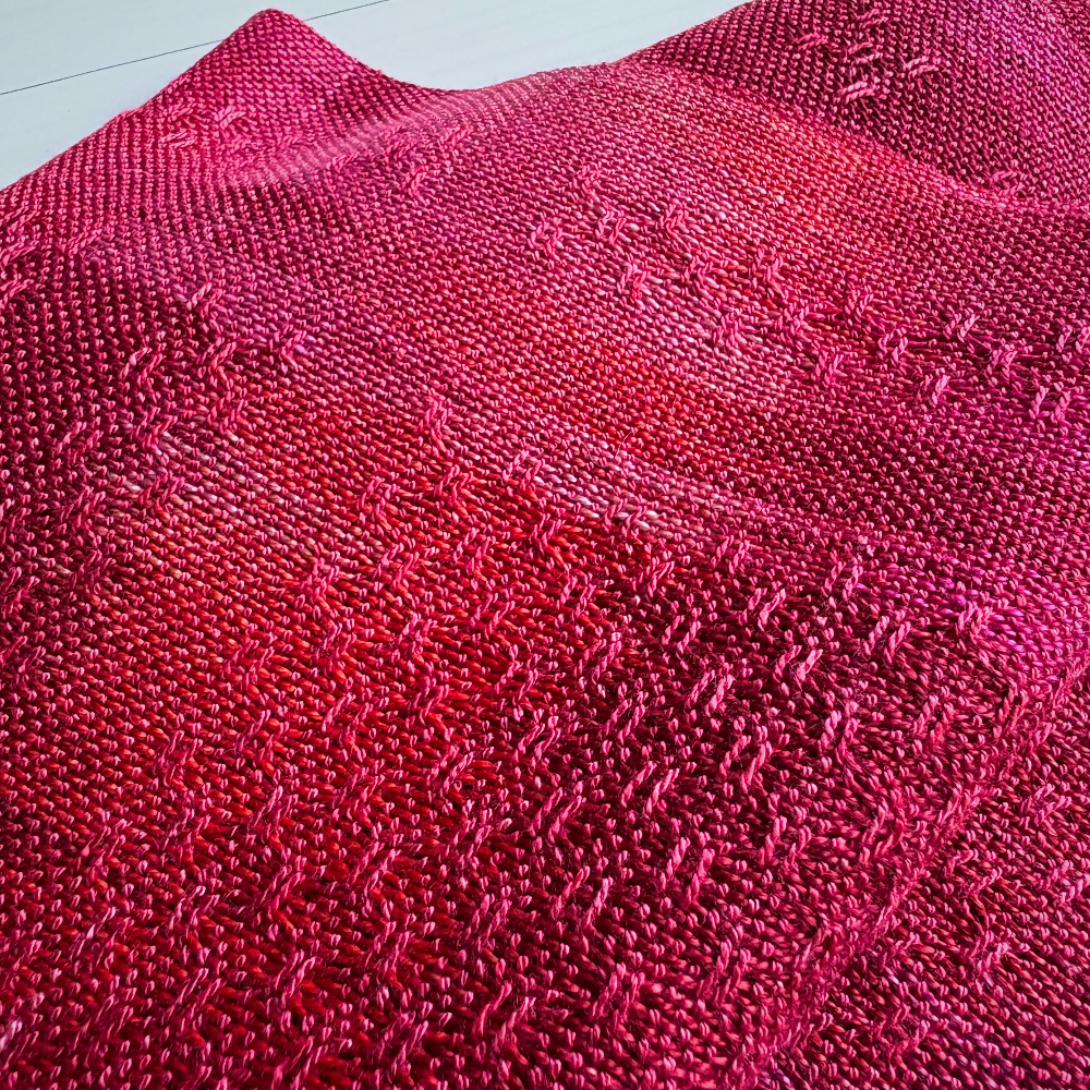 Dark-pink-tencel-scarf-flat-folded-closeup-handwoven-entangled-happiness-handwovens