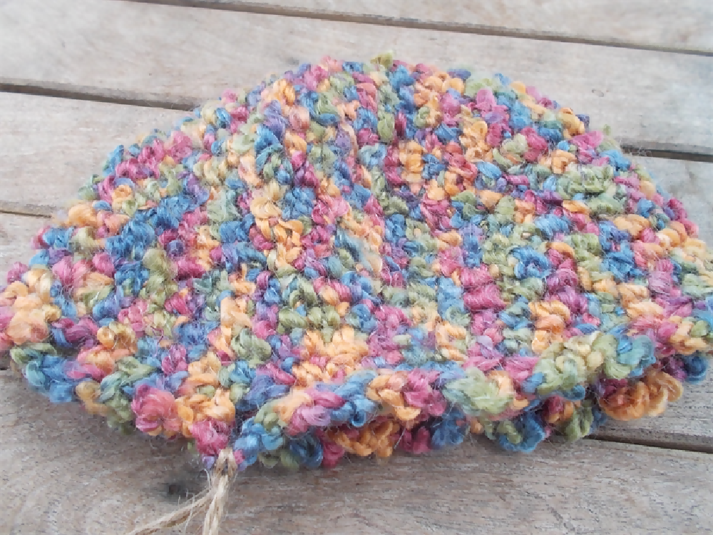 crocheted cloche made from pastel pure wool