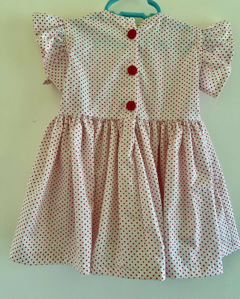 Red dots dress size 1 on white background
