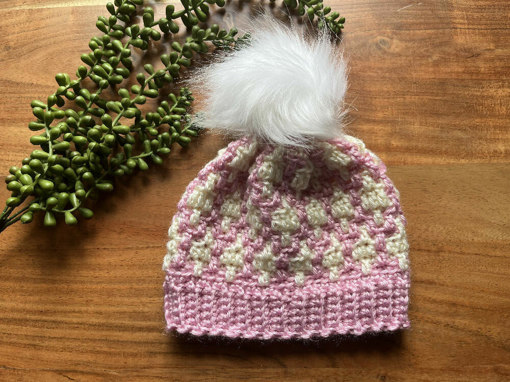 Pink and white children’s beanie