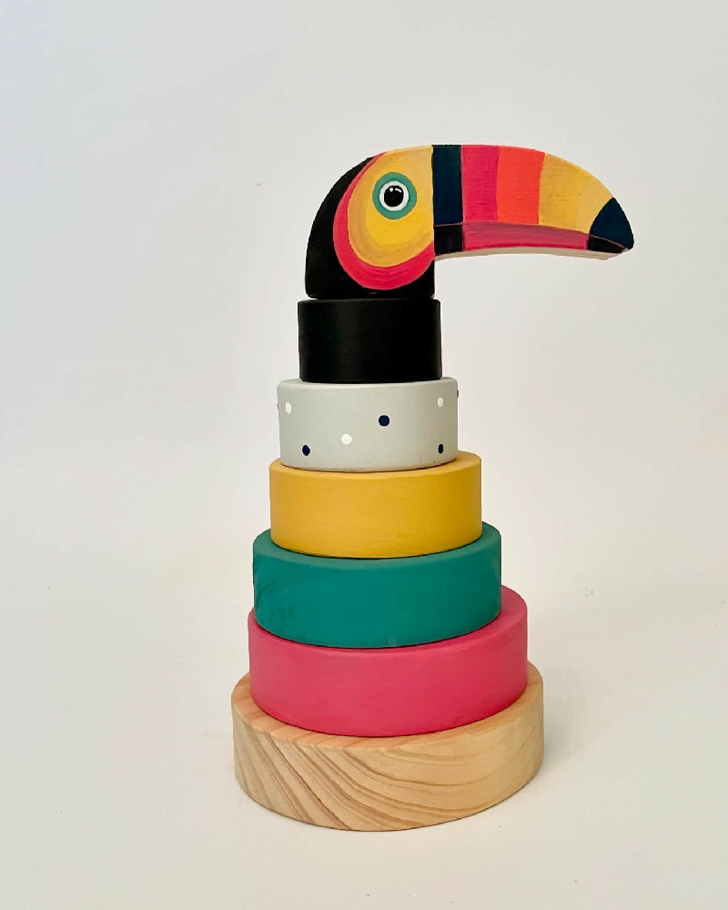 Ring stacker with toucan topper.