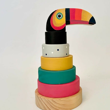 Ring stacker with toucan topper.