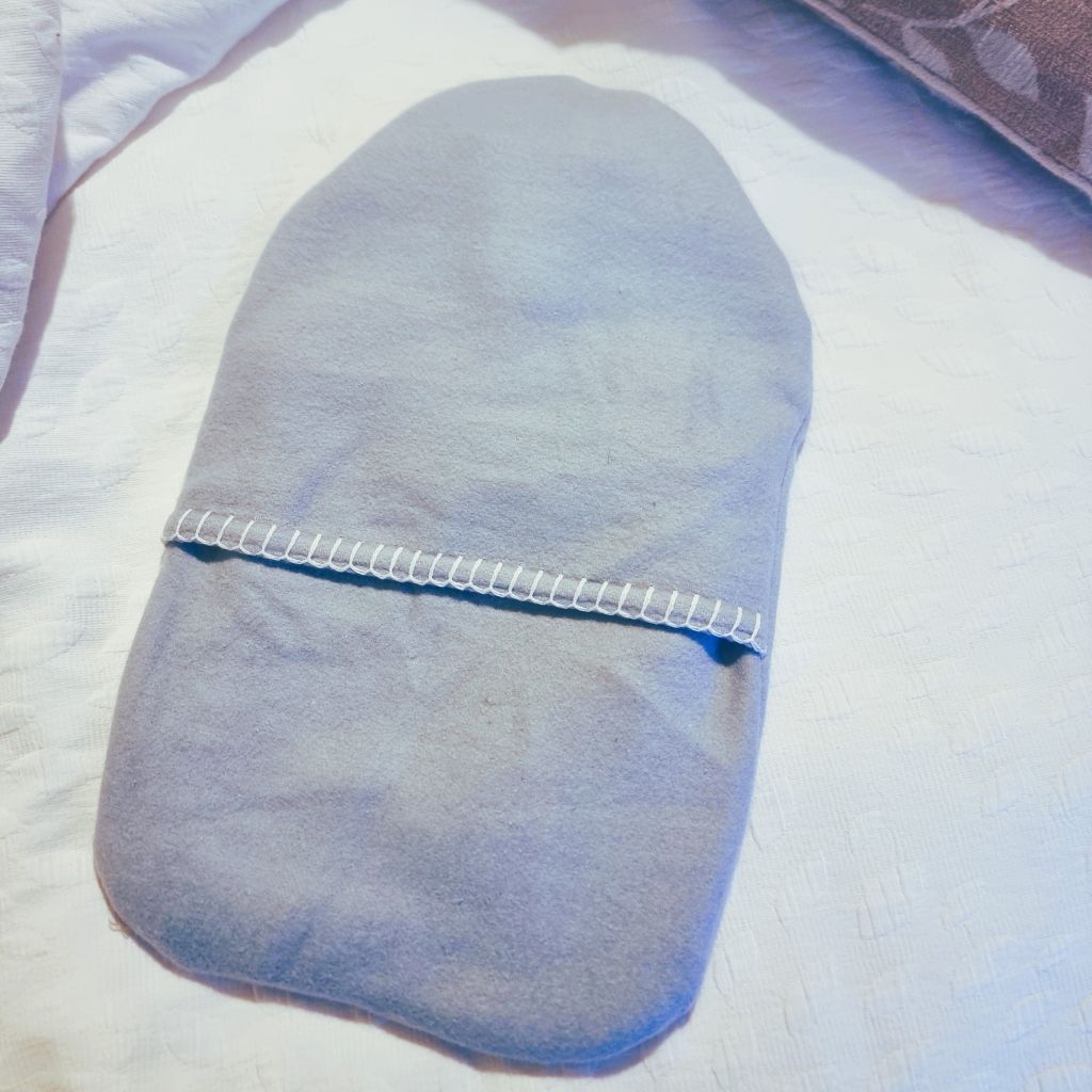 Upcycled hot water bottle cover - sun & clouds