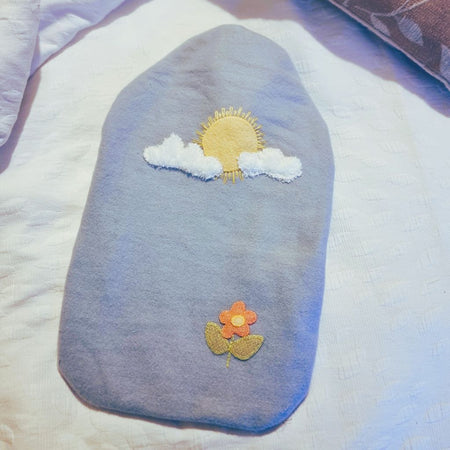 Upcycled hot water bottle cover - sun & clouds