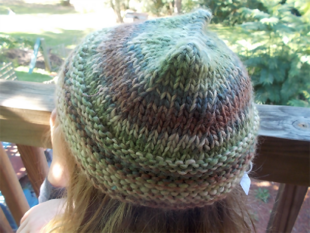 knitted child's beanie made from wool blend yarn