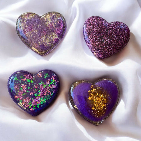 Set of four purple magnets