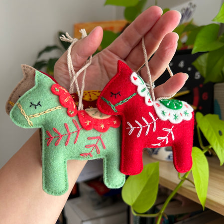 Scandinavian-inspired Dala horse ornament, hand embroidered for timeless holiday charm